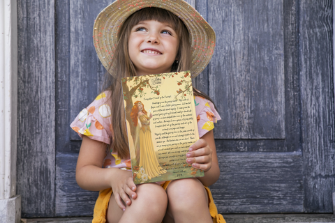 Little girl holding a fairy letter