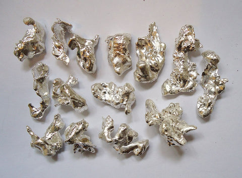 Shiny, irregularly shaped silver nuggets.