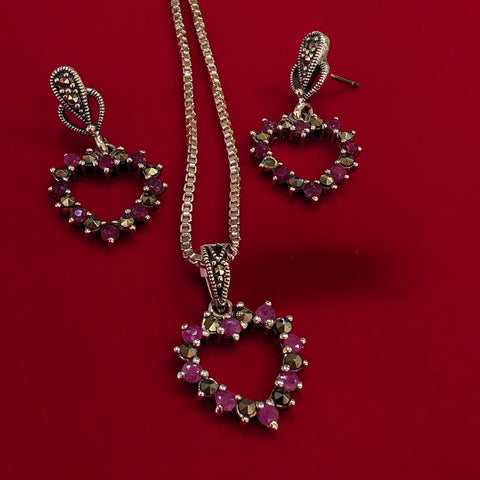 Heart pendant and earrings with alternating rubies and marcasite stones