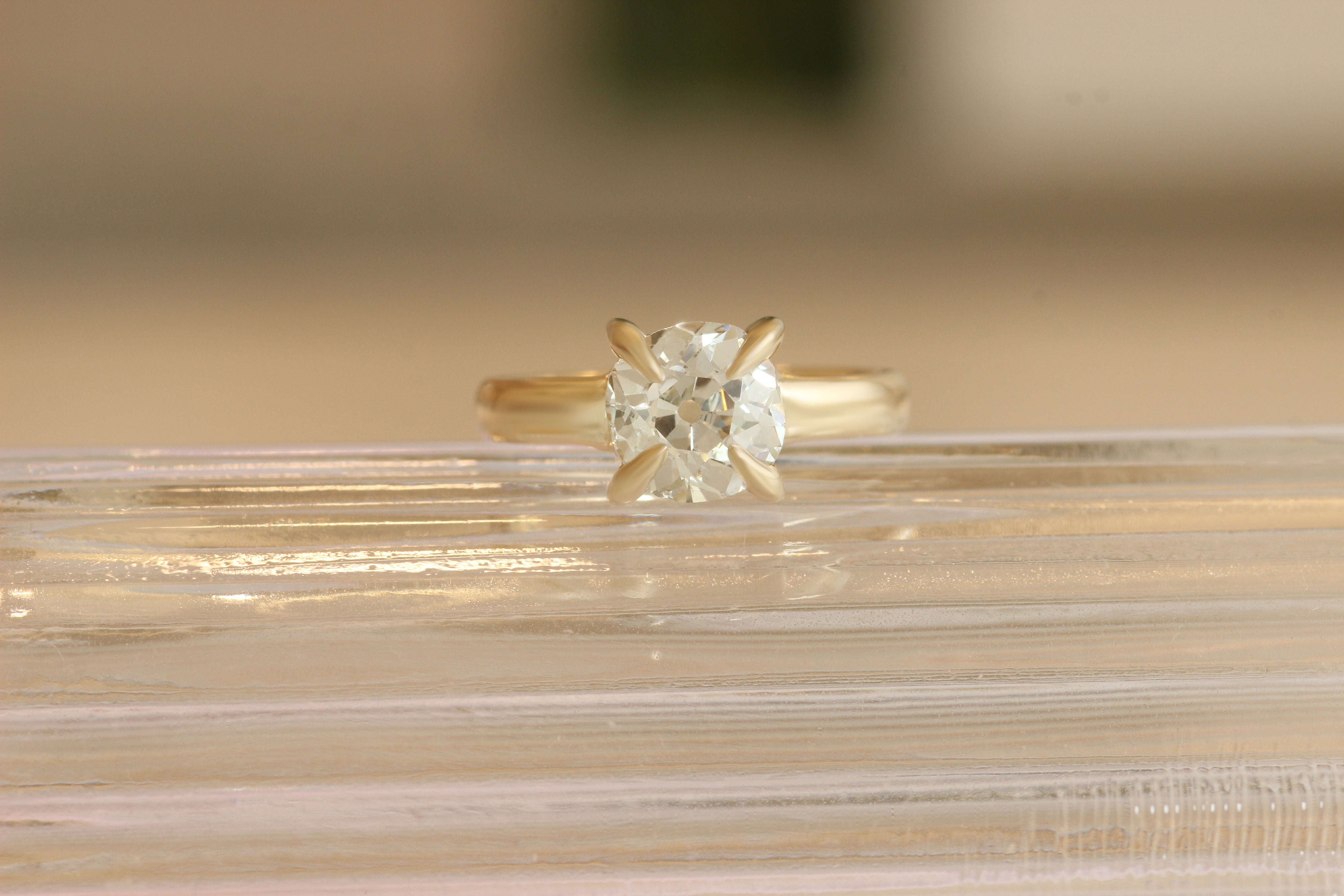 Side view of Adriana + Mike's custom engagement ring by Goldpoint Jewelry in Greenpoint, Brooklyn.