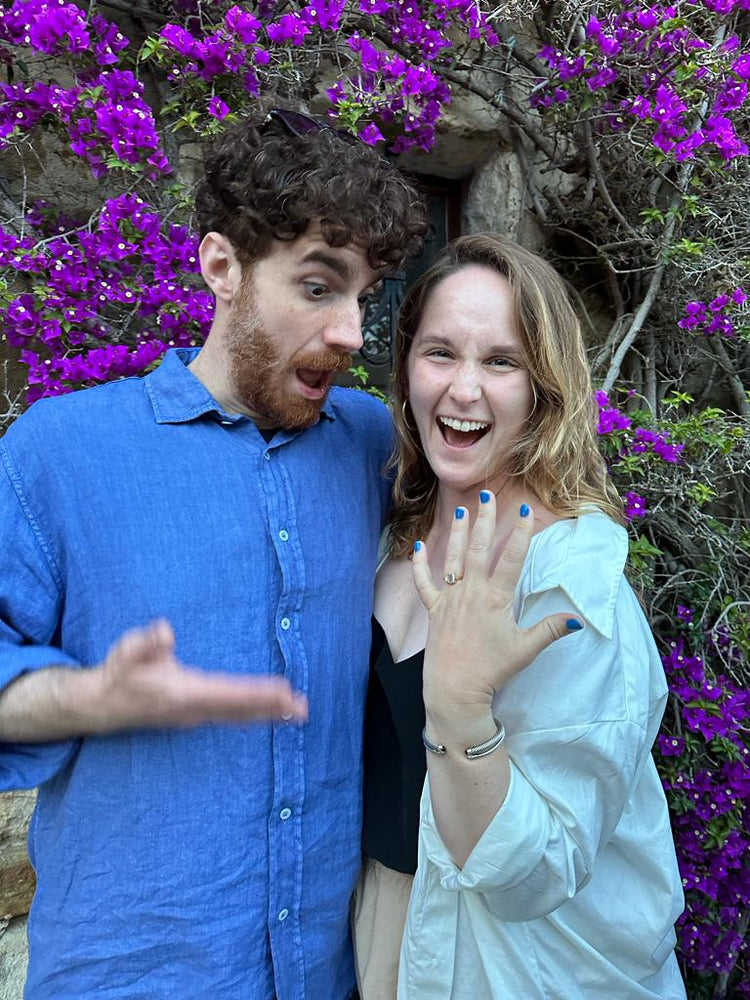 Group ohoto of Lydia + Vini's custom ring by Goldpoint Jewelry in Greenpoint, Brooklyn.