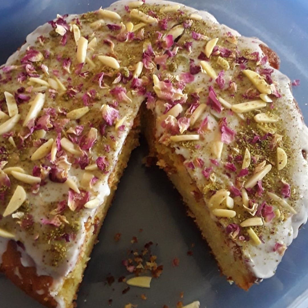 Persian Love Cake made with Exotic Bazaar Saffron Love Cake pre mix . Almond based gluten free cake with rosewater, rose petal garnish