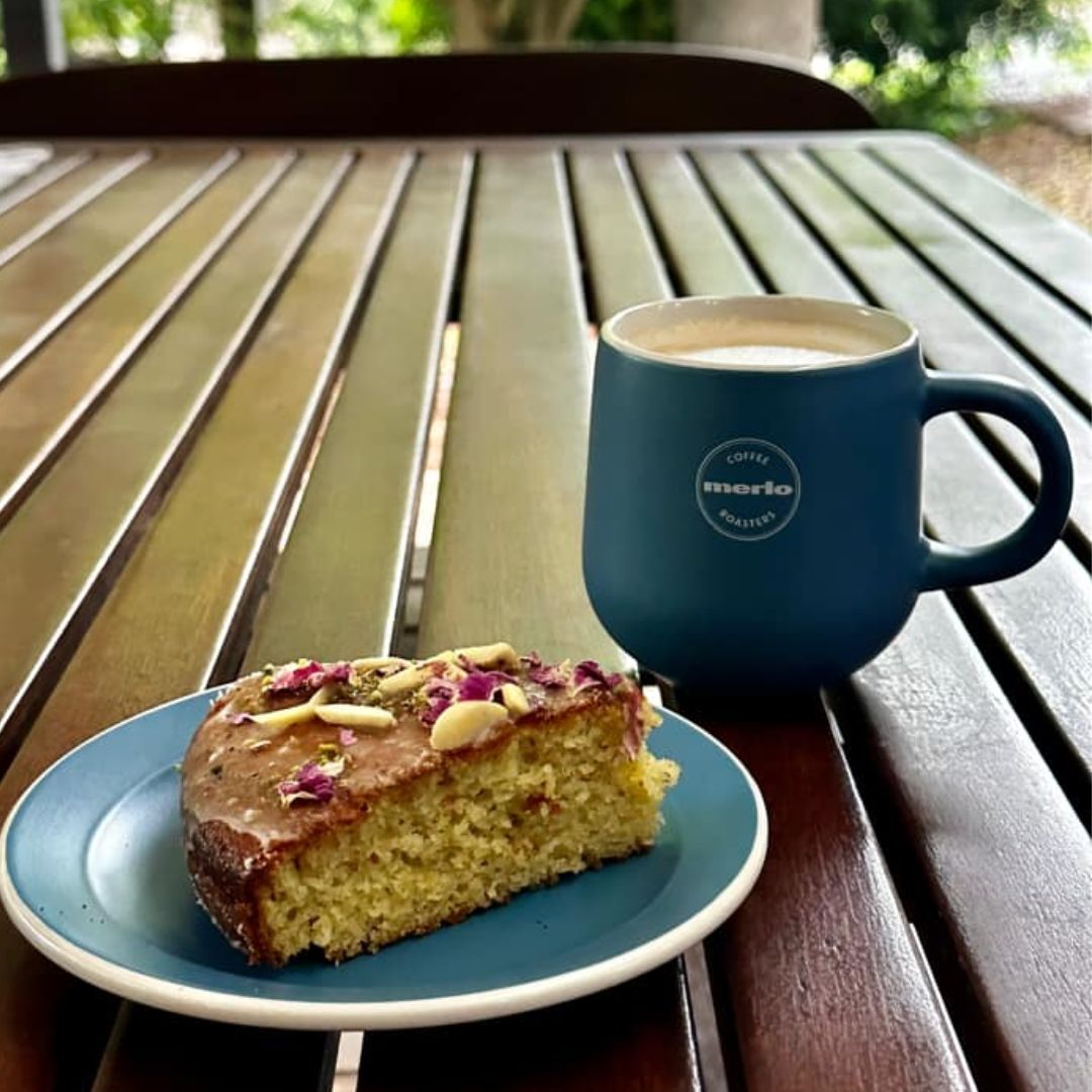 Persian Love Cake made with Exotic Bazaar Saffron Love Cake pre mix . Almond based gluten free cake with rosewater, rose petal garnish