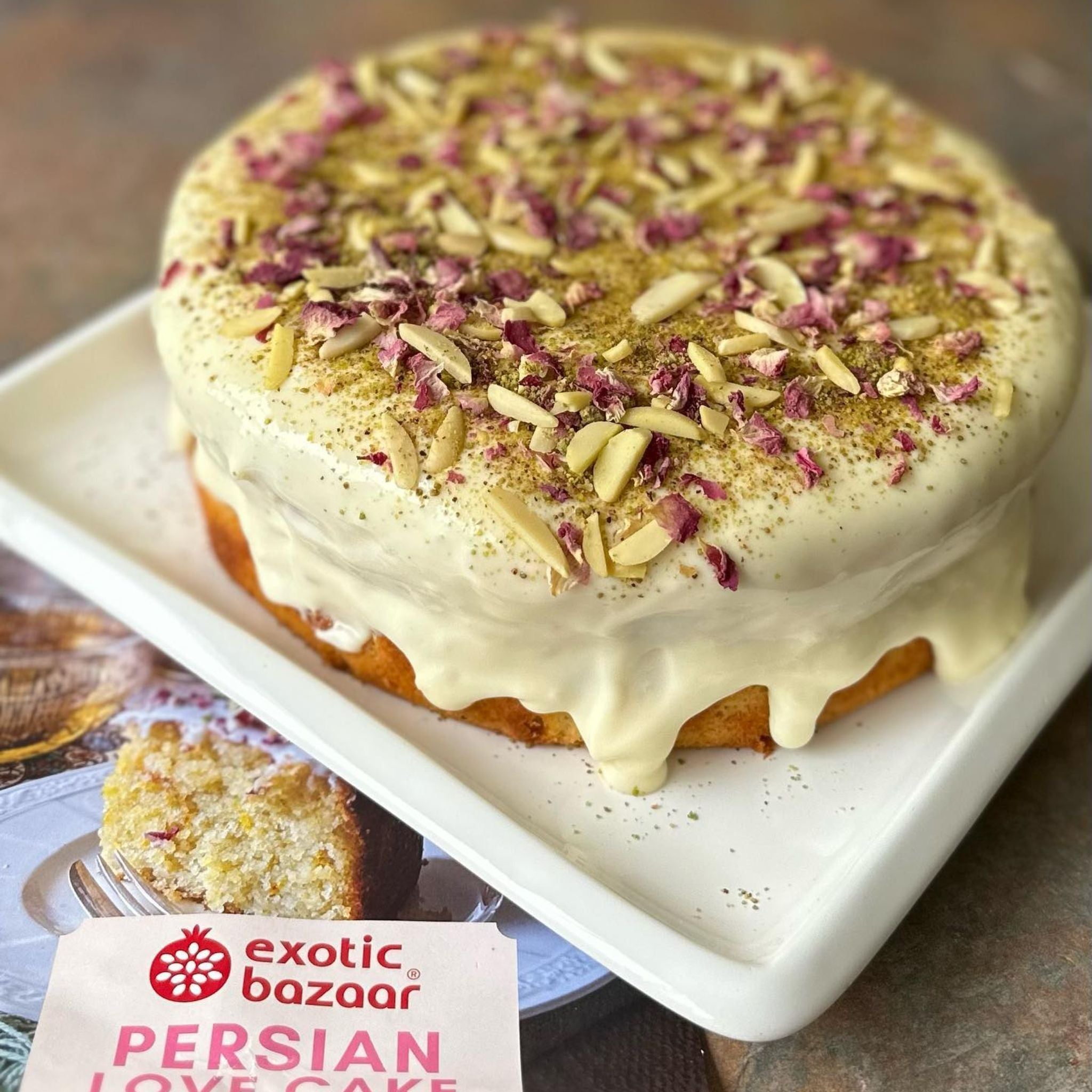 Persian Love Cake made with Exotic Bazaar Saffron Love Cake pre mix . Almond based gluten free cake with rosewater, rose petal garnish