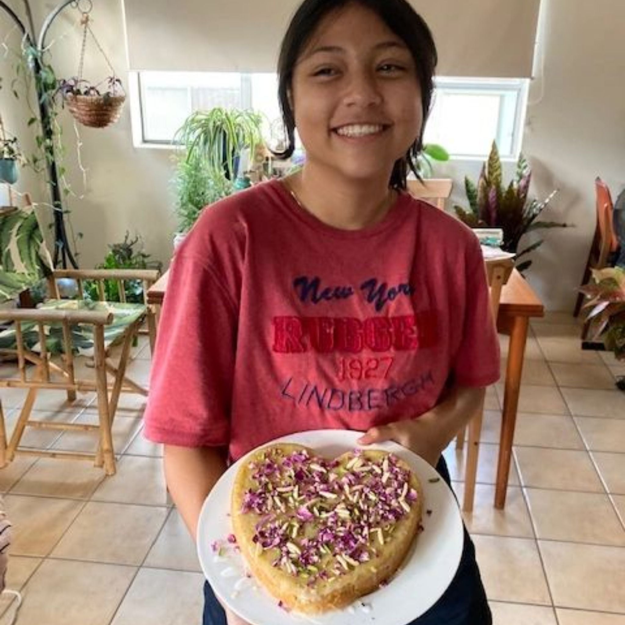 Persian Love Cake made with Exotic Bazaar Saffron Love Cake pre mix . Almond based gluten free cake with rosewater, rose petal garnish