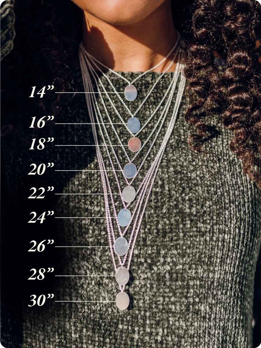 Necklace length guide with woman wearing charm necklaces in varying lengths from 18 inches to 30 inches