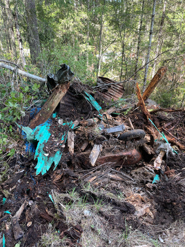 One of the uncovered trash piles