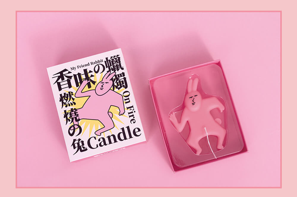 Humor-infused Pink Bunny Candle