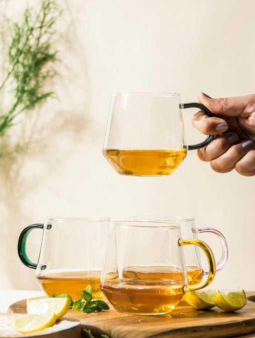 https://cdn.shopify.com/s/files/1/0589/5657/8969/products/buy-cups-and-mugs-transparent-glass-mug-or-tea-coffee-set-of-4-cups-for-kitchenware-and-gifting-by-the-table-fable-on-ikiru-online-store-1_512x678.webp?v=1693562126