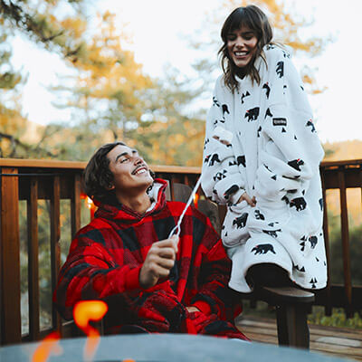 image of models wearing lumberjack blanket hoodie and Beary Christmas blanket hoodie