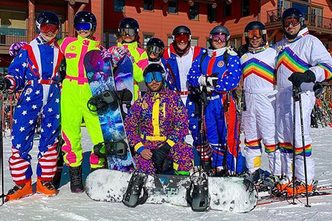 image of men wearing tipsy elves ski suits