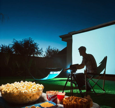 portable projector and snacks movie night