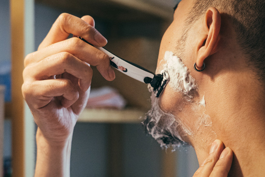 Man using a Bolin Webb razor, M Slowboy