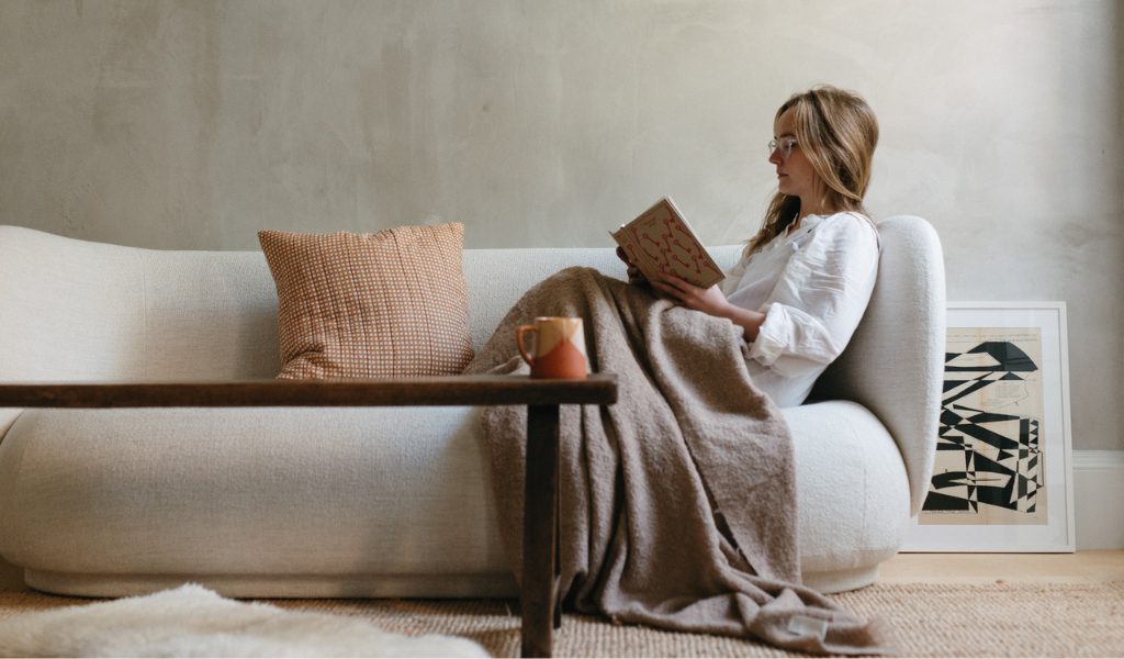 Snuggled up on the couch with an alpaca wool blanket