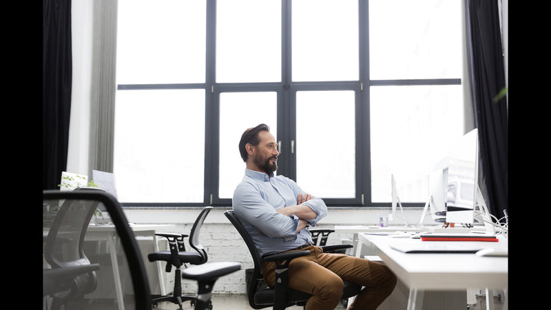 Mature Business Man Sitting Chair With Arms Folded 1 800x ?v=1681635245