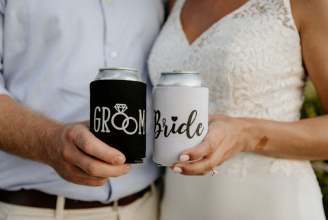 Bride and Groom Holding Matching Mr. and Mrs. Can Koozies