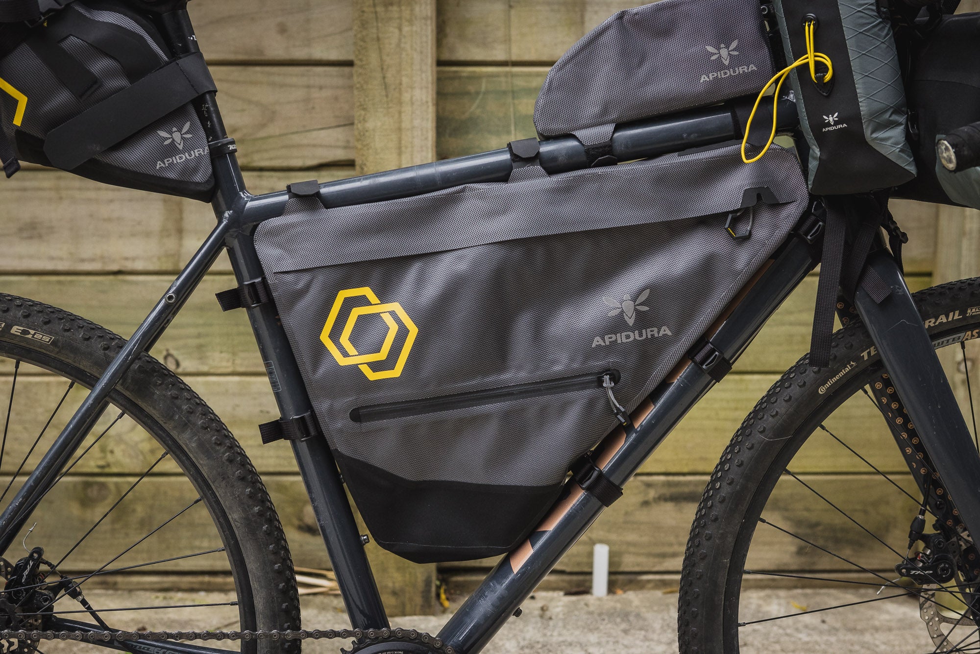 Kona Rove with an Apidura Expedition full-frame pack in the main triangle