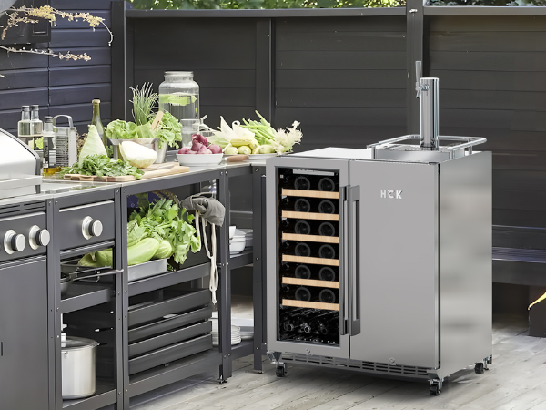 Side view of the 6.3 Cu Ft Stainless Steel Outdoor Refrigerator 34 Bottles Wine Cooler positioned in a suitable place in an outdoor kitchen setting