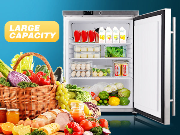  Front view of the 5.4 Cu Ft Stainless Steel Undercounter Outdoor Refrigerator with the door open, displaying the contents inside the fridge. A selection of food items is placed in front of the fridge to showcase its capacity