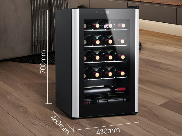 Side view of a living room setup installed with the 70L Freestanding Dual Zone Wine Fridge 24 Bottles, accompanied by lines and parameters to emphasize the product's size