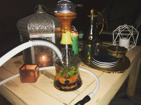 you may also use this kind of small glass hookah as fruit hookah as well. Add some fruits inside it. don't forget to try and put clay chillum at the top.