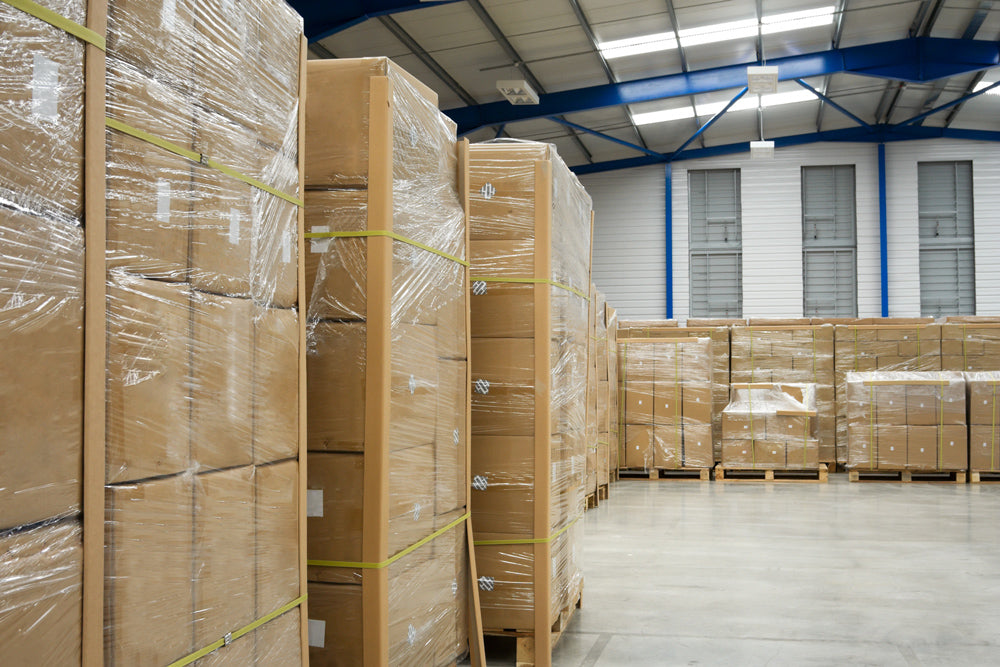 Stack of brown plain corrugated boxes ready for shipping