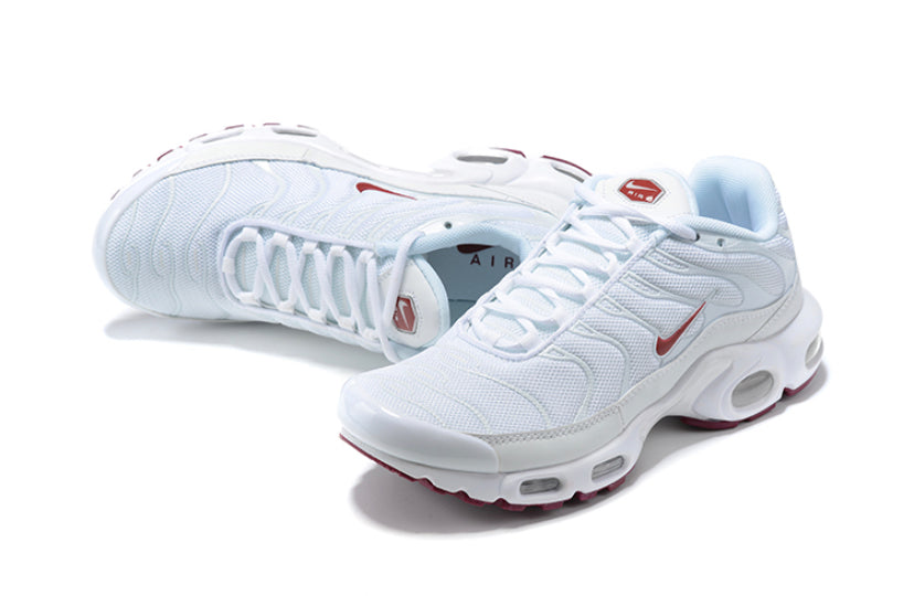 white tns with red tick