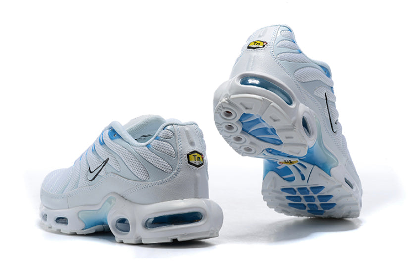 white tns with blue tick