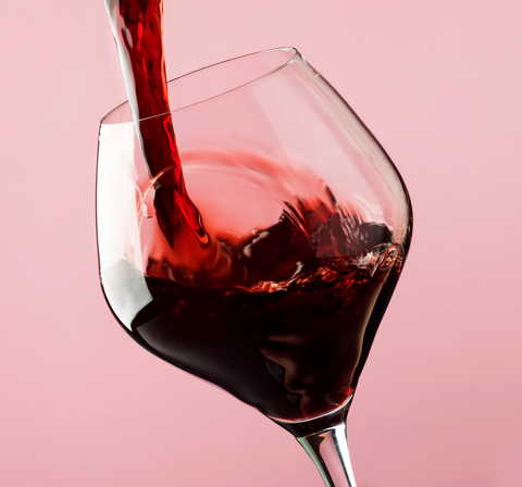 Pouring Red Wine in a Glass