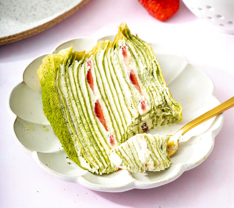 matcha crepe cake with fresh strawberries