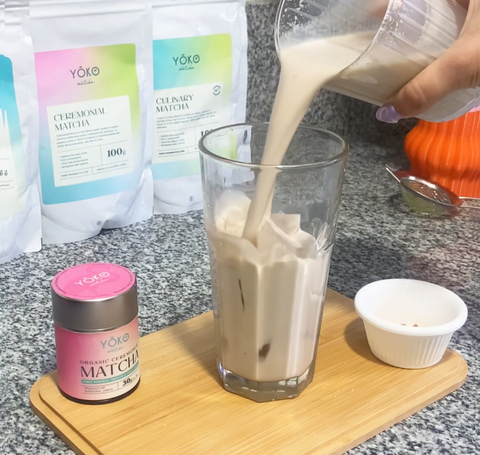 Pouring protein shake in a glass