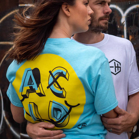 Acid house smiley t-shirt design in white and sky blue with yellow and black screen print