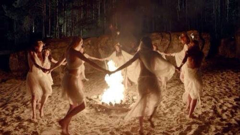 witches dancing by fire