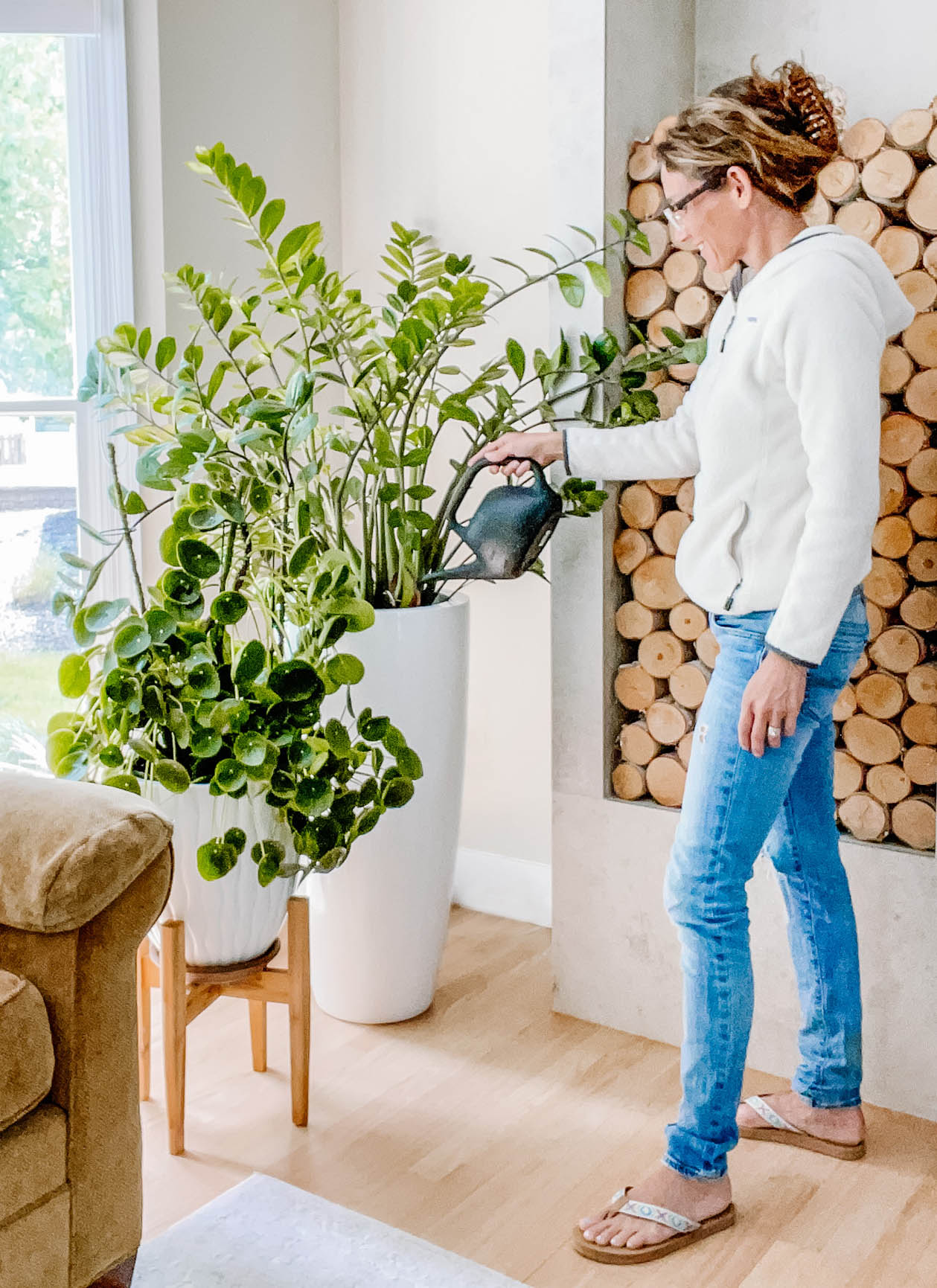 Angela watering plants