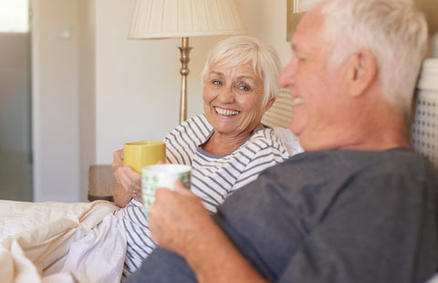 elderly couple drinking tea