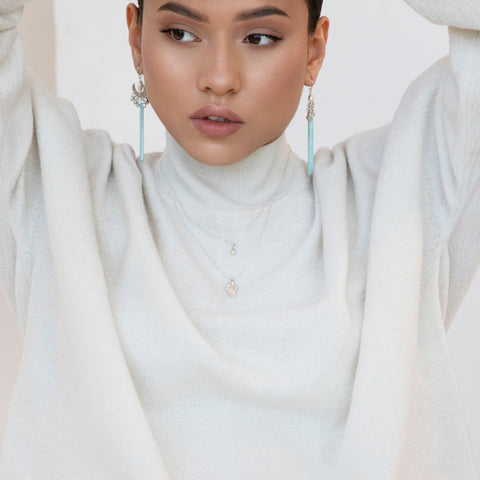 Model wearing amazonite and pearl earrings and recycled silver necklaces by Lunar James