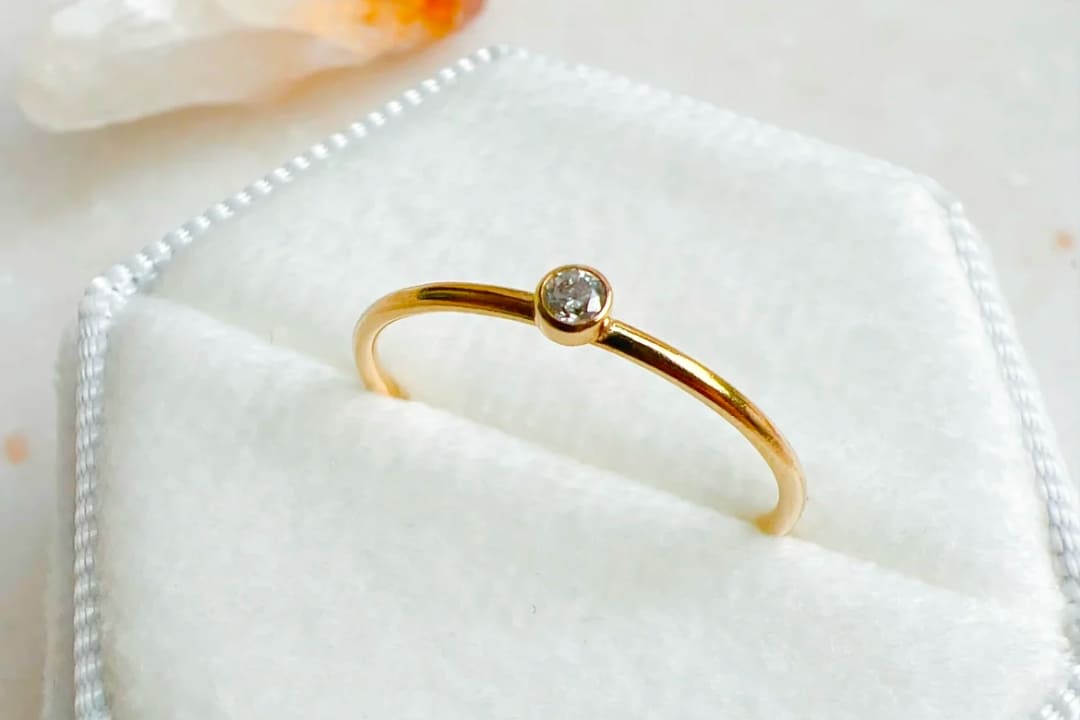 Bezel-set gemstone ring by Lunar James