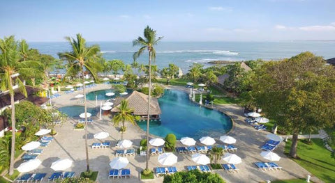 Swimming pool and hotels of Kuta Kartika Plaza Discovery Resort in Bali Indonesia 