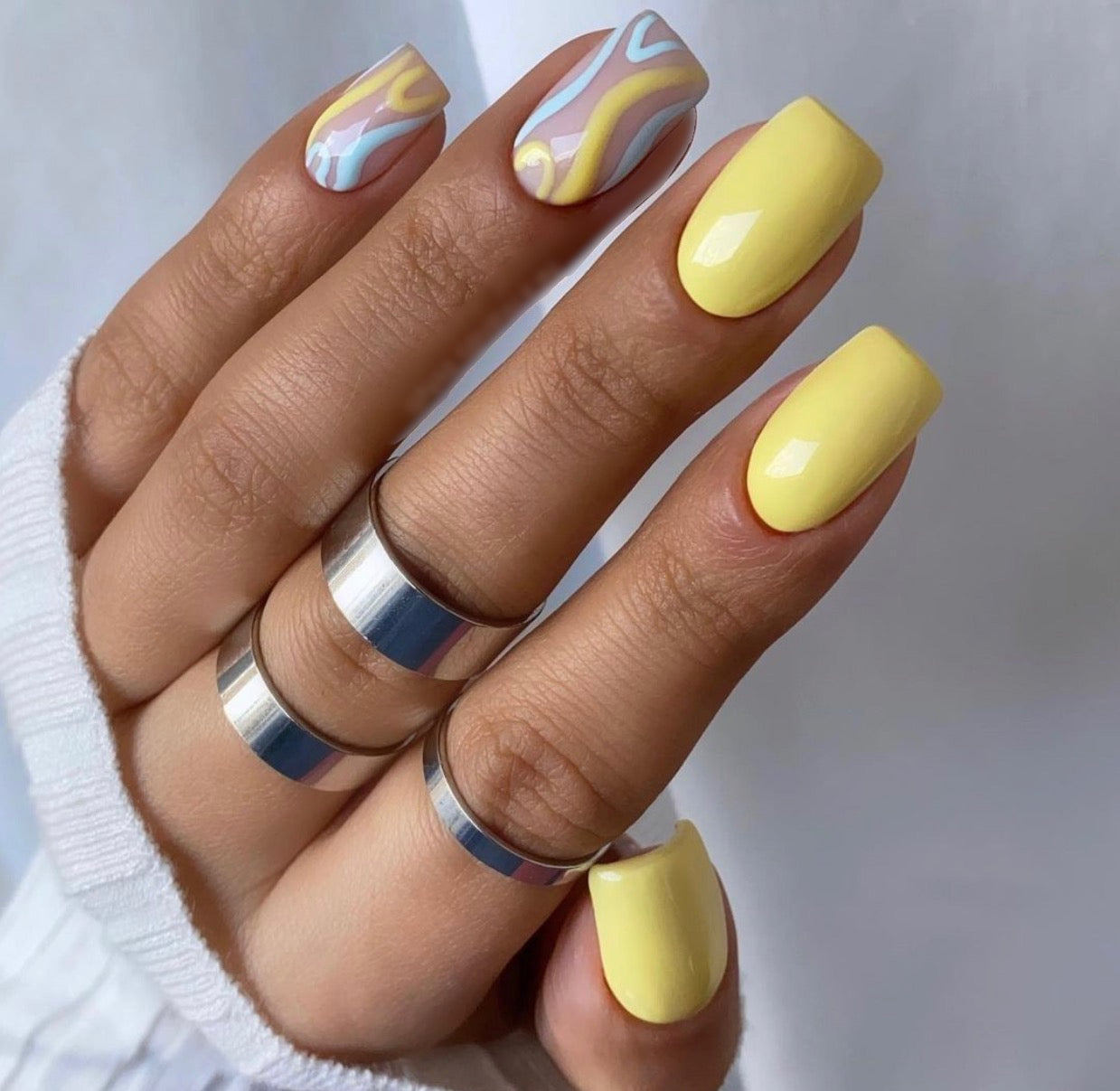 light blue and yellow nails