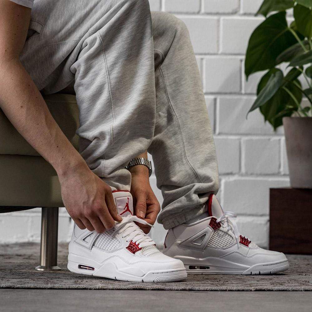 jordan 4 metallic red on feet