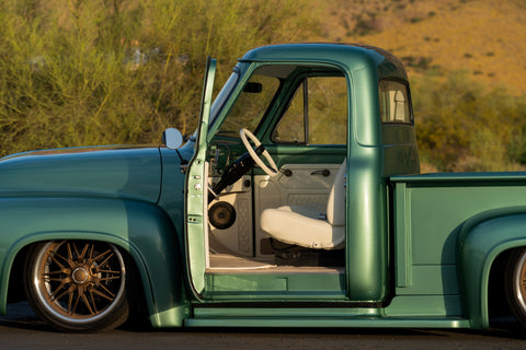 Green Ford 1955 side view door open