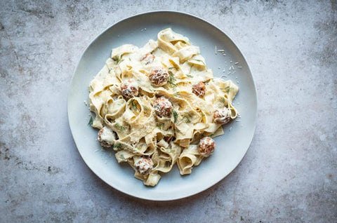 Wild Alaskan Salmon Meatballs with Dill Alfredo Sauce over Pasta