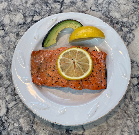 wild salmon on a plate with a lemon tastes so much better than a cedar plank delicious recipes for wild alaskan salmon 