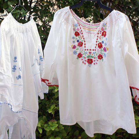 white blouse with embroidered details