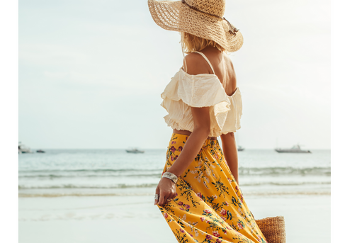 woman at the beach with maxi skirt