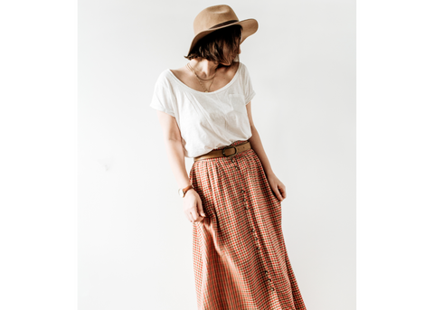 woman with maxi skirt and white blouse
