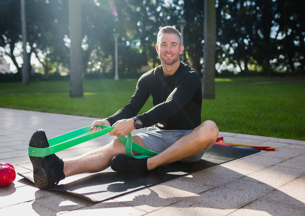 Sam Rooney stretching