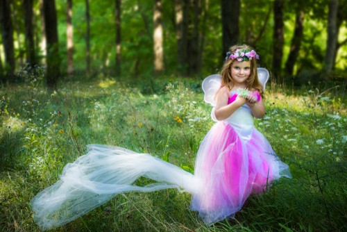 Girl dressed as princess in the woods