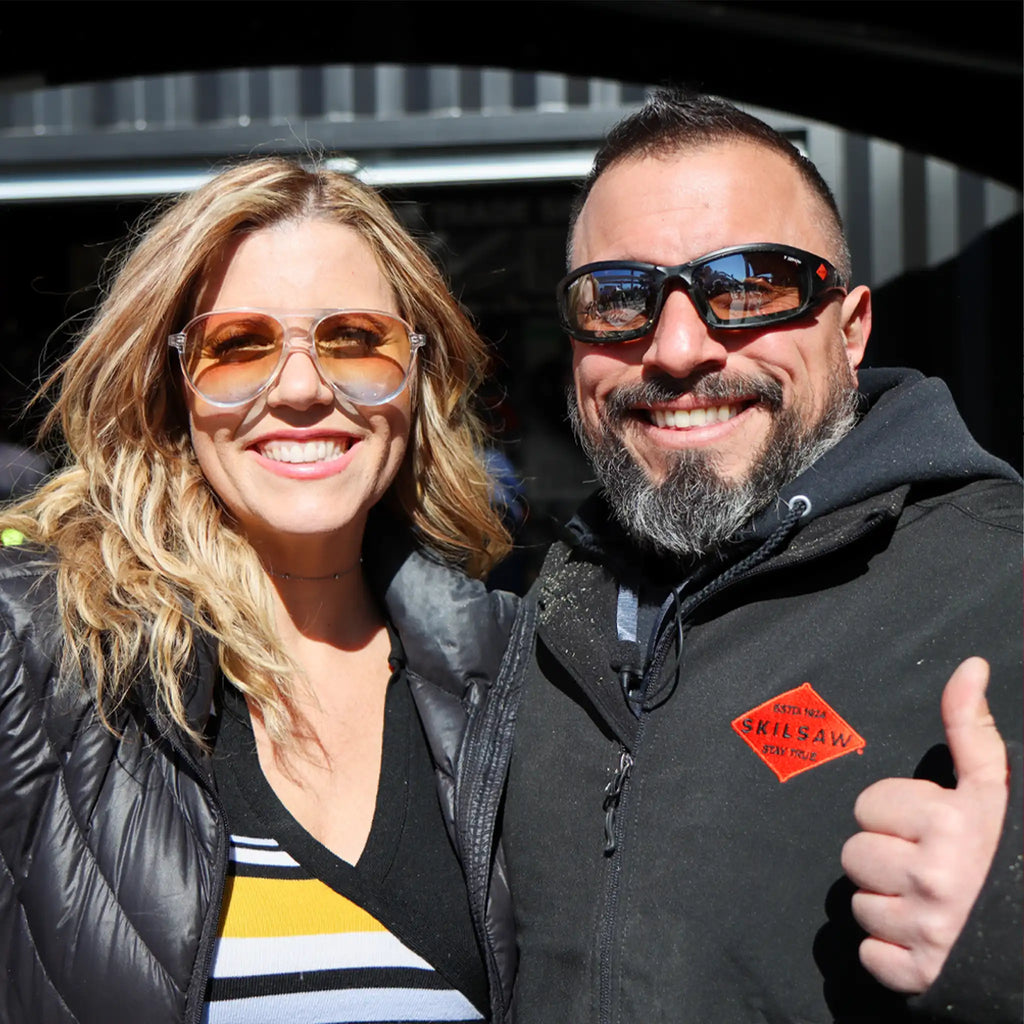 Vince and Katherine Emery smiling in SKILSAW booth at the World of Concrete 2020, showcasing tool industry camaraderie