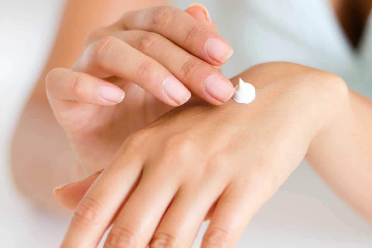 Woman using barrier cream